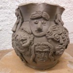 team pot where everybody works together to make a piece of pottery