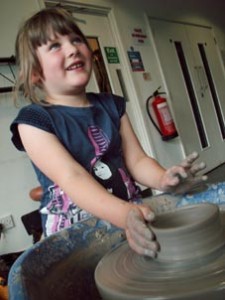 Children's summer holiday potter's wheel workshops at Eastnor Pottery, Herefordshire