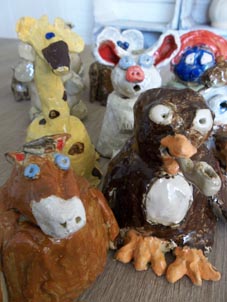 Coil pot creations made by children attending Eastnor Pottery's 1/2 term workshops