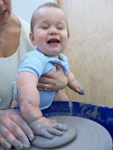 pottery sessions for new parents and their children at st thomas childrens centre led by jon the potter from eastnor pottery