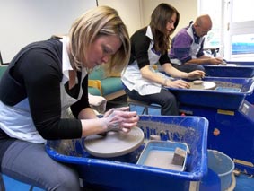 pottery break out session for senior management meeting at the cotswold conference centre broadway led by eastnor pottery and the flying potter