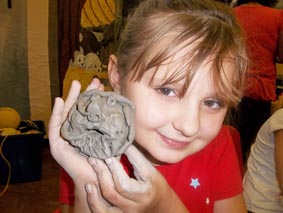 ancient greek heads made from clay made at broadlands primary school hereford led by jon the potter from eastnor