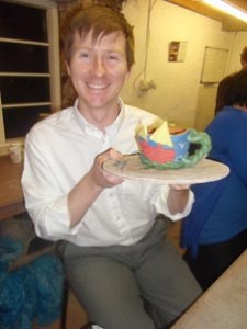 corporate hospitality at its best. a pottery participant with his splendid coil pot made at eastnor pottery