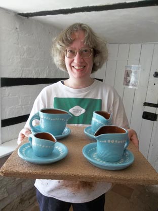 gillian and her cream jugs she made at eastnor pottery weekend potter's wheel workshop