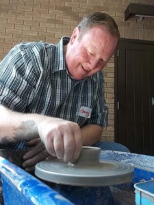 gerry the photographer trys his hand at pottery on the potter's wheel