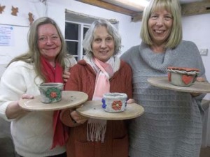 three life long friends enjoy making and painting pottery at eastnor pottery