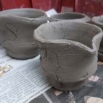 school children make pots on the potters wheel in hereford