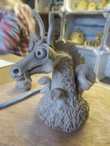 pottery dragon made by a dad visiting eastnor pottery with his family