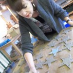 Tracey making pottery stars for the children in her class as an end of term gift for them all