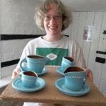 Potter Gillian displays her pottery handywork made at Eastnor Pottery