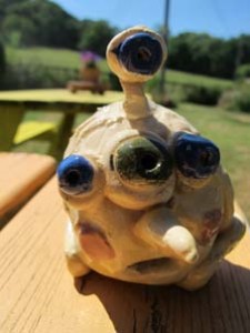 ceramic alien made by a pupil at Colwall Primary School