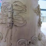 Clay pottery pot decorated with butterflys