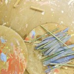 Pottery tools and boards covered in coloured slips