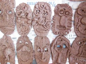 Clay masks made by YR2 at Leominster Infants school Herefordshire