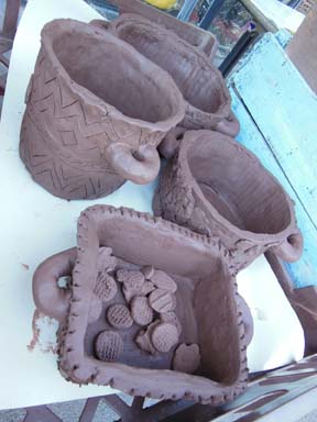 Collaborative clay cooking pots made by children at Brearley and Teviot Nursery School in Brum