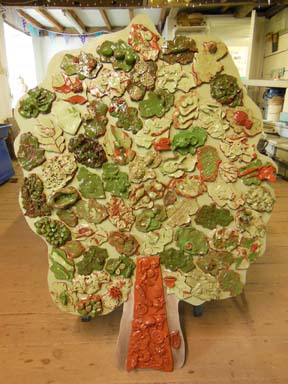 Pottery tile panel made by Nursery School children in Ledbury Herefordshire