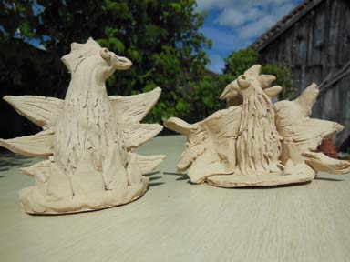 Firebirds clay sculpture made at Cherry Orchard Primary School Worcester