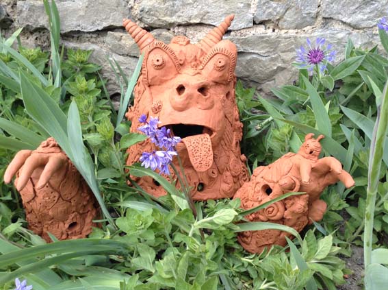 Terracotta beastie made by families at the opening event at The Masters House Ledbury Herefordshire workshops led by potters Sarah and Lottie from Eastnor Pottery