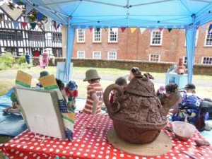 Eastnor Pottery work with families to create celebratory tea set at Ledbury Poetry Festival