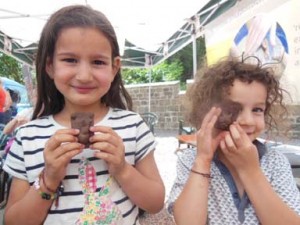 Eastnor Pottery and all ages create small tiles for giant tea set for 150th Alice in Wonderland anniversary