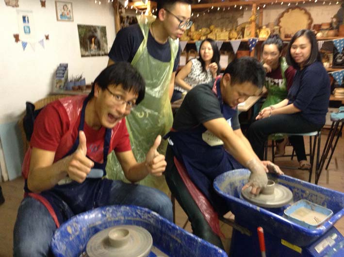 Having fun on the Potter's Wheel at Eastnor Pottery