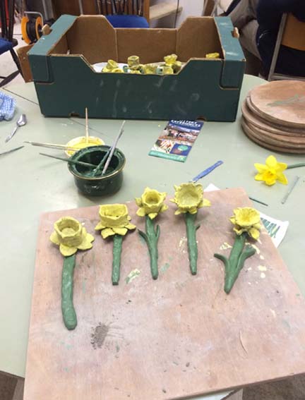 Eastnor Pottery leading clay workshop making daffodils in Bromsberrow