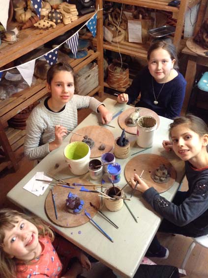Colourful cats and dogs made at Eastnor Pottery's Children's Halfterm workshop