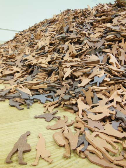 Ceramic people shapes looking like Autumn leaves