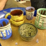 painted clay pots made on the potter's wheel by a beginner