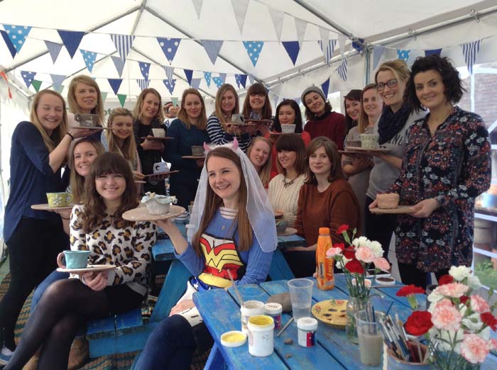 Hen party enjoy the boutique environment of the Potting Tent on the Pottery lawn at Eastnor Pottery