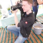 Jack Eastnor Pottery's Digital Marketing Apprentice taking photos of Pottery themed Hen Party