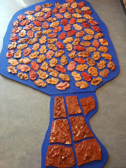 Holyoaks Primary School in Redditch worked with Eastnor pottery and the Flying Potter to make tree shaped tile panel