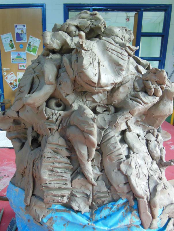 Squashed Owl made of Clay at Ledbury Primary School with Eastnor Pottery