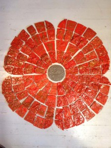 Poppy tile panel made by children at Devonshire Academy and Eastnor Pottery in the West Midlands