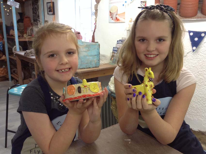 A potter's wheel pot turned into a giraffe by a creative child at Eastnor Pottery & The Flying Potter