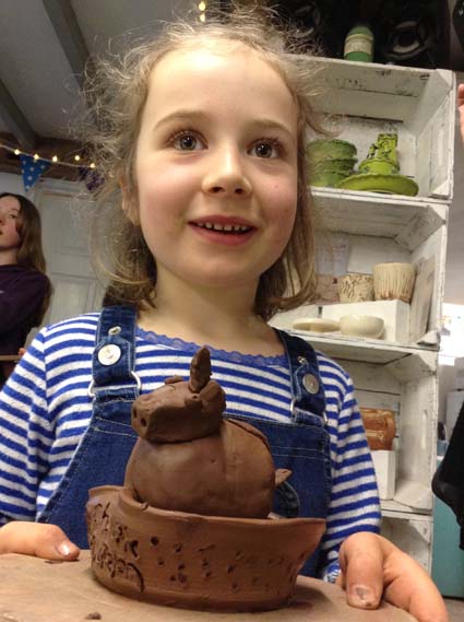 Children get to make a pot on the potterywheel at eastnor pottery