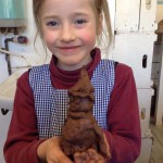 Pupil from Winterfold House School models a clay figure inspired by Julia Donaldson's illustrations