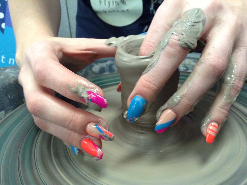 long painted nails on the potter's wheel at Expo 2017 photo competition runner up by Jon williems