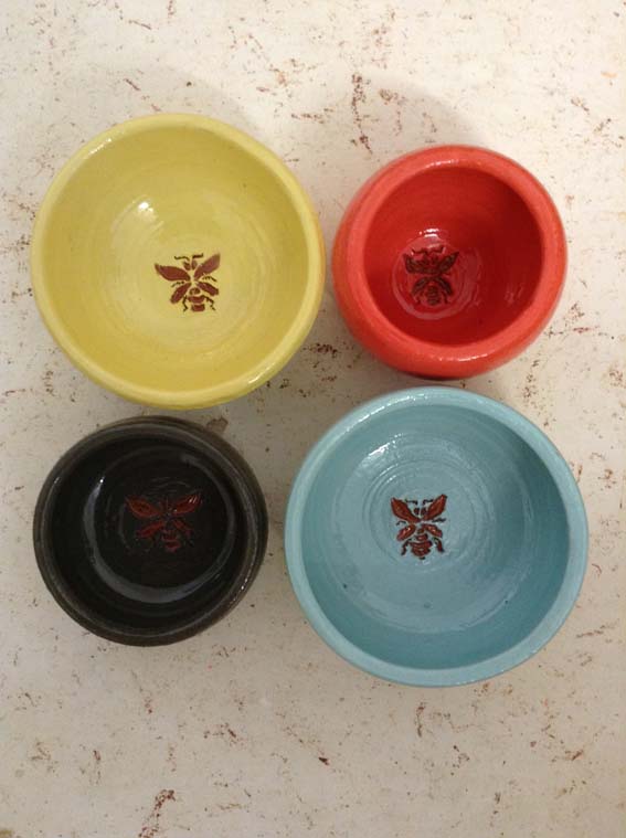 glazed bowls with sgraffito bee design