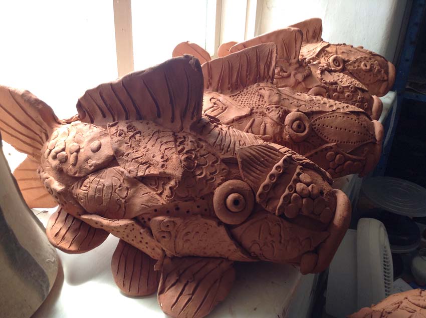 terracotta koi carp made by Regency High School Worcester SEN