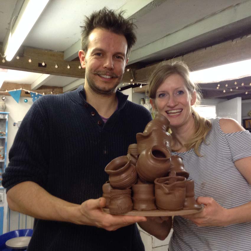 first time potters try their hand at the potter's wheel at Eastnor Pottery in Herefordshire